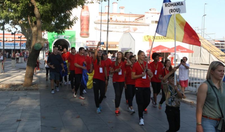 Andreea Grecu, atletă legitimată la CS Farul Constanța și pilot al echipajului de bob dublu România 2, a purtat drapelul României în timp ce delegațiile participante la Campionatul Mondial au defilat pe promenada din Mamaia