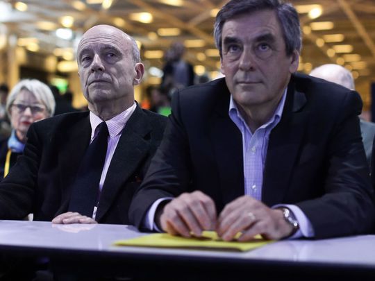 Moderatul Alain Juppé și liberalul Francois Fillon