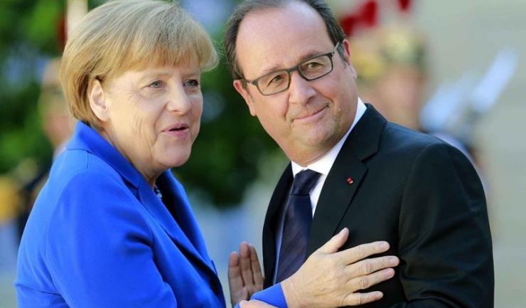Angela Merkel l-a îmblânzit pe Hollande în privința imigranților