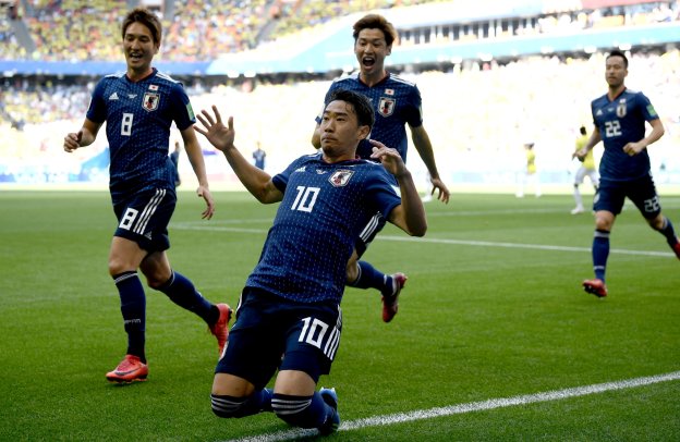 Japonezul Kagawa (nr. 10) a deschis scorul din penalty (sursa foto: Facebook FIFA World Cup)