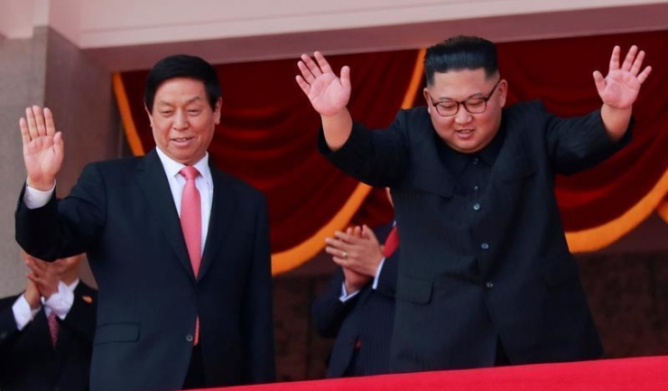 Liderul nord-coreean Kim Jong Un, alături de Li Zhanshu, „numărul trei” în ierarhia Partidului Comunist din China