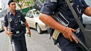 Poliţia malaeziană a arestat 14 persoane suspectate de legături cu SI