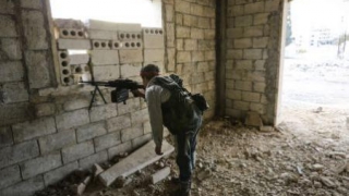 Cel puţin 52 de morţi în confruntări militare la periferia oraşului Damasc