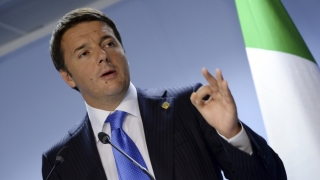 Premierul Italiei cere UE suspendarea finanţării pentru statele care refuză imigranţi