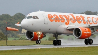 Un analist financiar a panicat pasagerii unui avion britanic