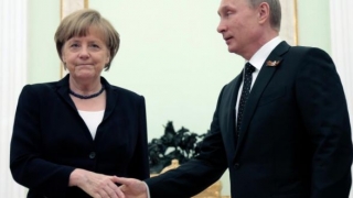 Putin şi Merkel au discutat despre crizele din Ucraina şi Siria