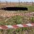 Groapă de 5 metri diametru apărută pe un câmp din 23 August